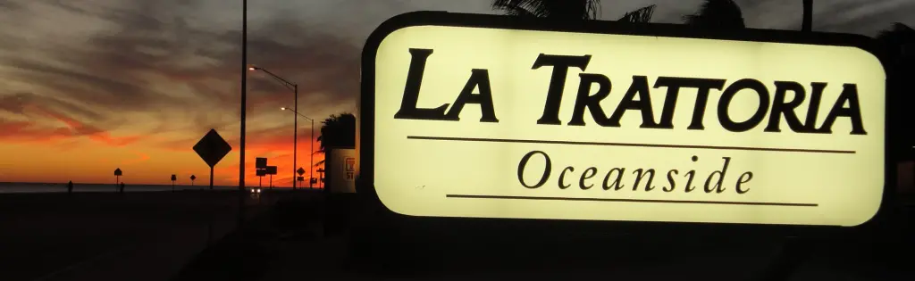 La Trattoria Oceanside sign at sunset on South Roosevelt Boulevard in Key West